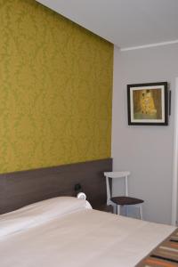 Posteľ alebo postele v izbe v ubytovaní MA Hotel