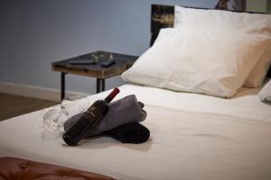 Postel nebo postele na pokoji v ubytování Bubalus Boutique Rooms