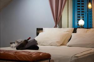 Postel nebo postele na pokoji v ubytování Bubalus Boutique Rooms