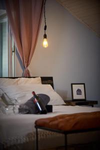 Postel nebo postele na pokoji v ubytování Bubalus Boutique Rooms