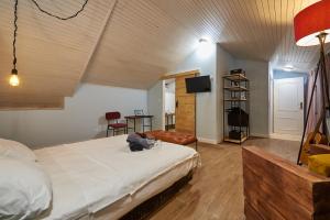 Postel nebo postele na pokoji v ubytování Bubalus Boutique Rooms