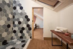 Postel nebo postele na pokoji v ubytování Bubalus Boutique Rooms