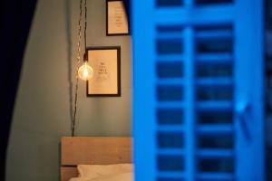 Postel nebo postele na pokoji v ubytování Bubalus Boutique Rooms