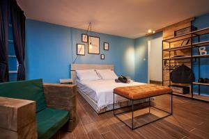 Postel nebo postele na pokoji v ubytování Bubalus Boutique Rooms