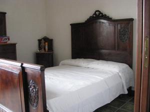 Una cama o camas en una habitación de Spiaggia della tonnara