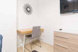 Telewizja i/lub zestaw kina domowego w obiekcie Homemalaga Álamos Luxury