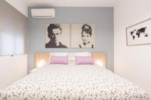 Łóżko lub łóżka w pokoju w obiekcie Homemalaga Álamos Luxury