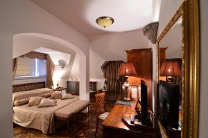 Postel nebo postele na pokoji v ubytování Scala Boutique-Hotel + 37 fotografií