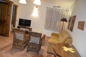 TV a/nebo společenská místnost v ubytování Apartamentos Rurales Natura