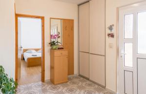 Łóżko lub łóżka w pokoju w obiekcie Apartments Contessa