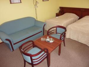Postel nebo postele na pokoji v ubytování Grandhotel Garni