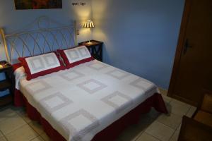 Postel nebo postele na pokoji v ubytování Apartamentos Rurales Natura