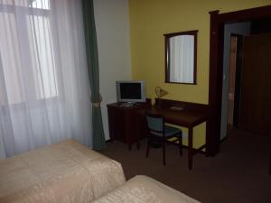 Postel nebo postele na pokoji v ubytování Grandhotel Garni