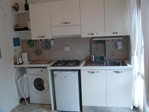 Kuchyň nebo kuchyňský kout v ubytování Casa Privata FOR YOU