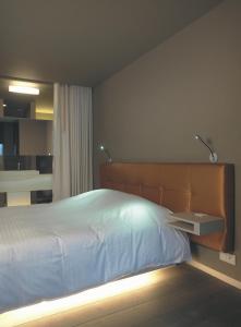 Postel nebo postele na pokoji v ubytování Hotel Shamrock