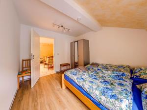 Ein Bett oder Betten in einem Zimmer der Unterkunft Gästehaus Eschbach