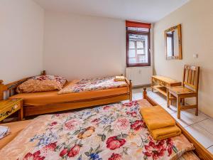 Ein Bett oder Betten in einem Zimmer der Unterkunft Gästehaus Eschbach
