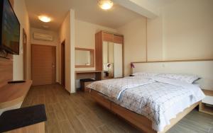 Ένα ή περισσότερα κρεβάτια σε δωμάτιο στο Apartments Paklenica