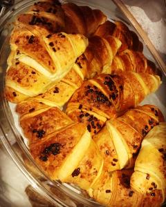 a pile of pastries in a glass plate at North Point Rooms in Froúrion