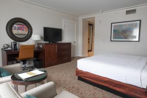 a hotel room with a bed and a tv at Wind Creek Bethlehem Casino & Resort in Bethlehem