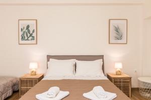 Posteľ alebo postele v izbe v ubytovaní Aloe Apartments