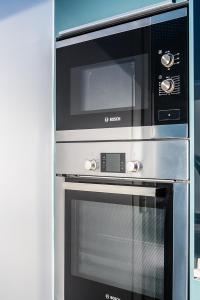 Kuchyň nebo kuchyňský kout v ubytování Apartamento Sants