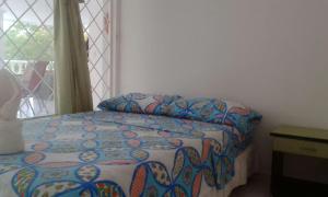 Postel nebo postele na pokoji v ubytování Hotel Bellavista Isla del Sol