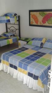 Postel nebo postele na pokoji v ubytování Hotel Bellavista Isla del Sol