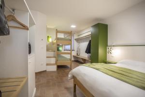 Postel nebo postele na pokoji v ubytování Agriturismo Cjargnei