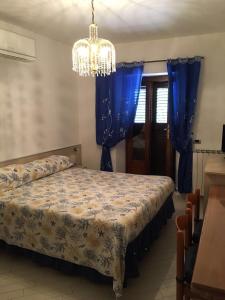 A bed or beds in a room at Affittacamere AlFrantoio Még 10 kép