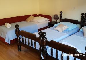 Postel nebo postele na pokoji v ubytování City Retro Chic Apartment Magdalena Trogir