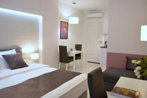 Łóżko lub łóżka w pokoju w obiekcie JessApart – Ochota Apartments