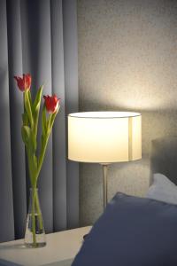 Łóżko lub łóżka w pokoju w obiekcie JessApart – Ochota Apartments