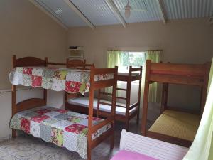 Divstāvu gulta vai divstāvu gultas numurā naktsmītnē Residencial dos Portugas