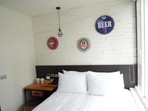 Postel nebo postele na pokoji v ubytování Re-Change Hotel Taipei