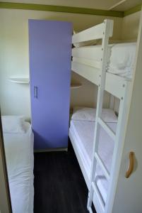 Letto o letti in una camera di Camping Fossa Lupara