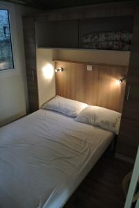 Letto o letti in una camera di Camping Fossa Lupara