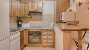 A kitchen or kitchenette at Saplan Real Estate PLETA NHEU
