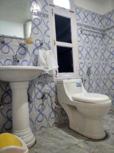Phòng tắm tại Hotel Kalpa Deshang