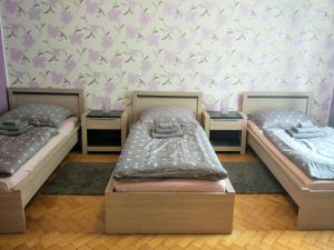 Postel nebo postele na pokoji v ubytování Apartments Týnská 7