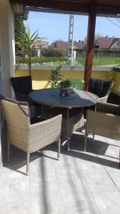 Patio nebo venkovní prostory v ubytování Dűlő Apartmanház + 15 fotografií