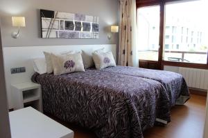 Кровать или кровати в номере Hotel Las Olas