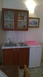 Virtuvė arba virtuvėlė apgyvendinimo įstaigoje Li Trappiti