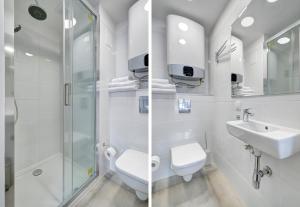 ソポトにあるDR Apartments - Fiveのバスルーム(シャワー、トイレ、シンク付)