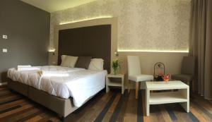 Postel nebo postele na pokoji v ubytování Hotel Gardesana