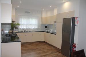 Kuchyň nebo kuchyňský kout v ubytování Residence Argine
