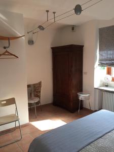 Postel nebo postele na pokoji v ubytování Vicolo del Pozzo