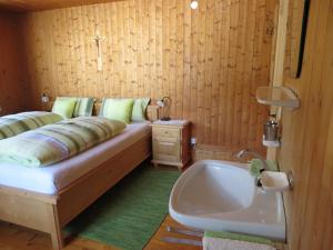 Łóżko lub łóżka w pokoju w obiekcie Walcheggerhof