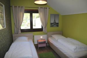 Ein Bett oder Betten in einem Zimmer der Unterkunft Chalet Beau Regard