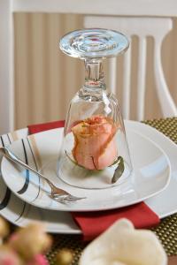 a plate with a glass jar on top of a table at Hörnlestubn in Bad Kohlgrub